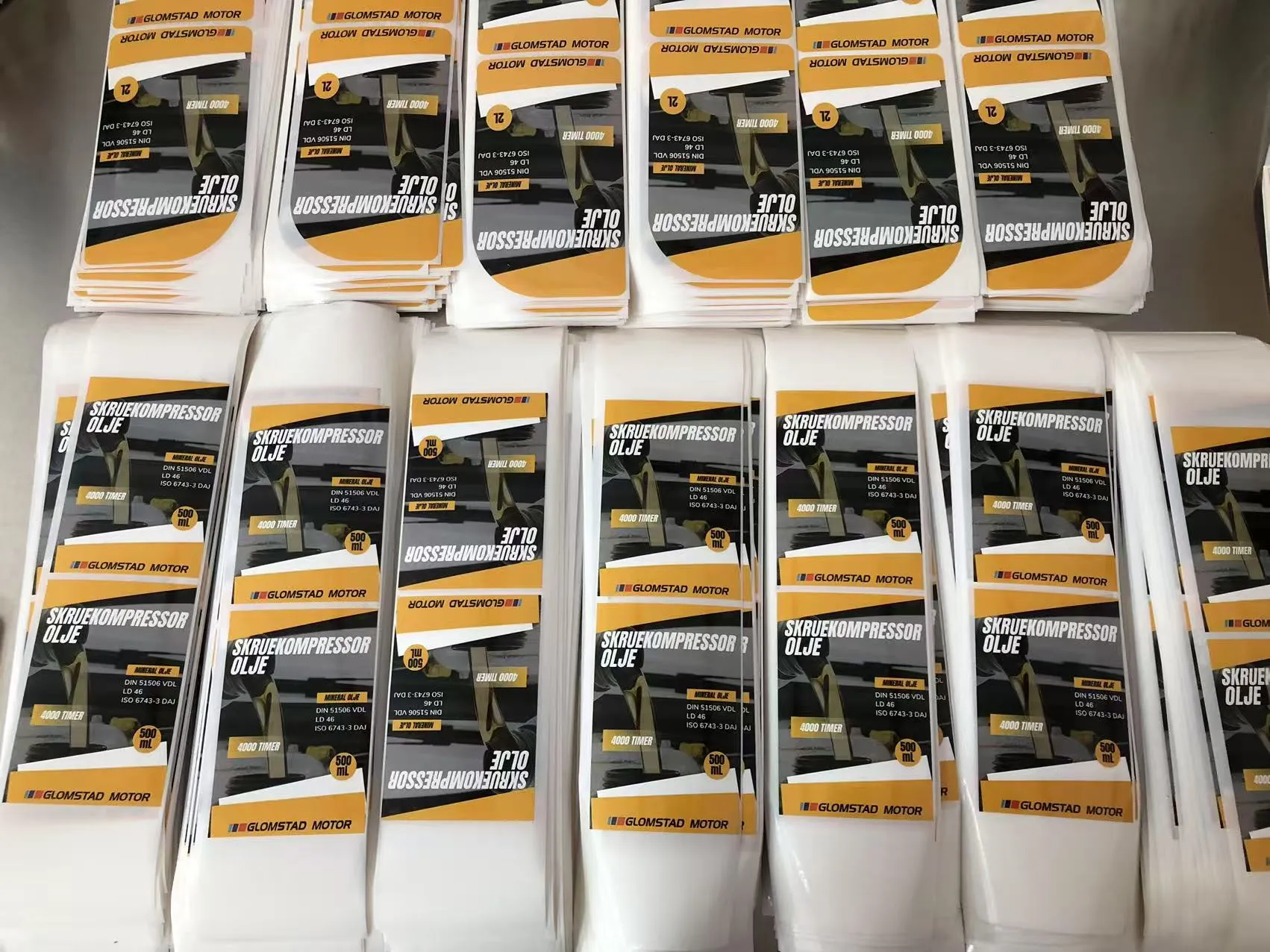 JOJO paketas išsiunčia variklinės alyvos etiketę į Norvegiją